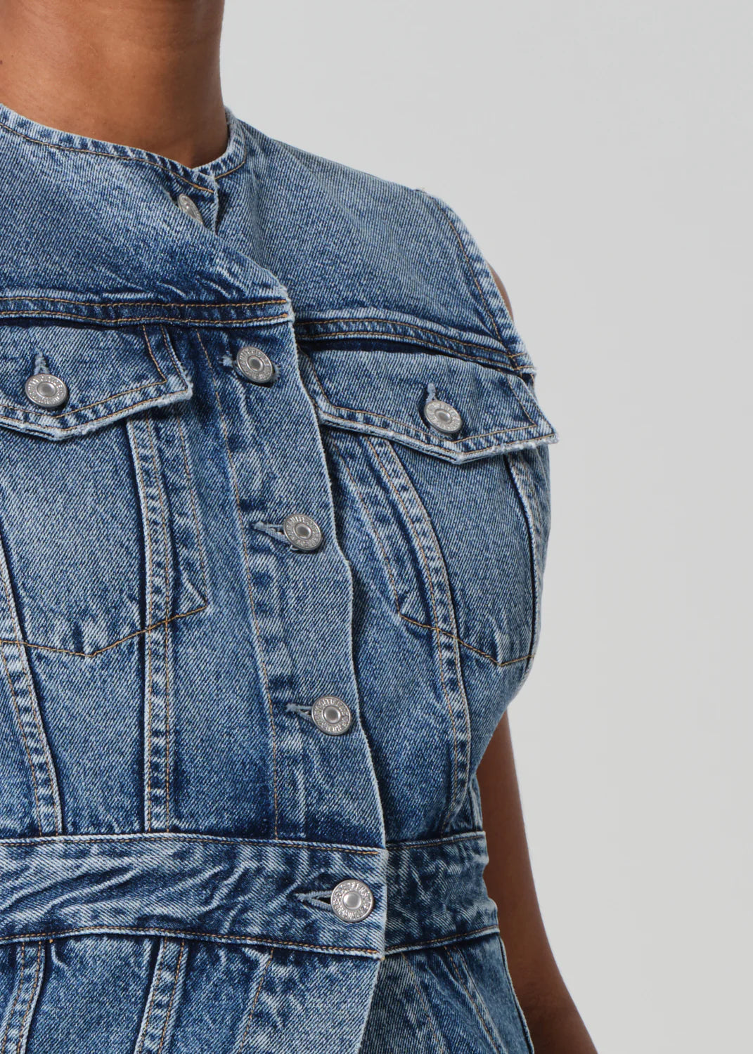 Citizens of Humanity Idaline medium indigo denim vest close-up showing buttons and chest pockets