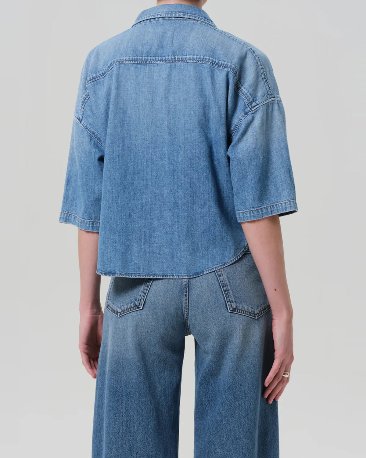 Citizens of Humanity Frances cropped cape button up shirt in Skyland light blue denim, back view