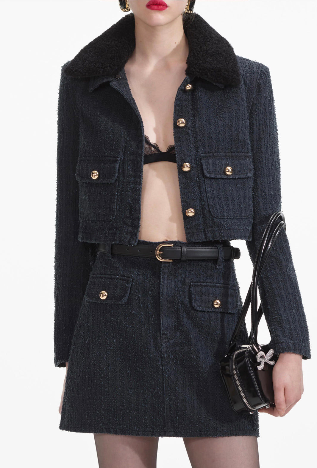Self-Portrait grey textured denim jacket with black faux fur collar and gold buttons, front close-up view