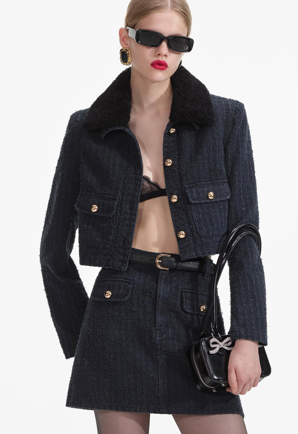 Self-Portrait grey textured mini skirt and matching jacket with gold buttons, close-up view