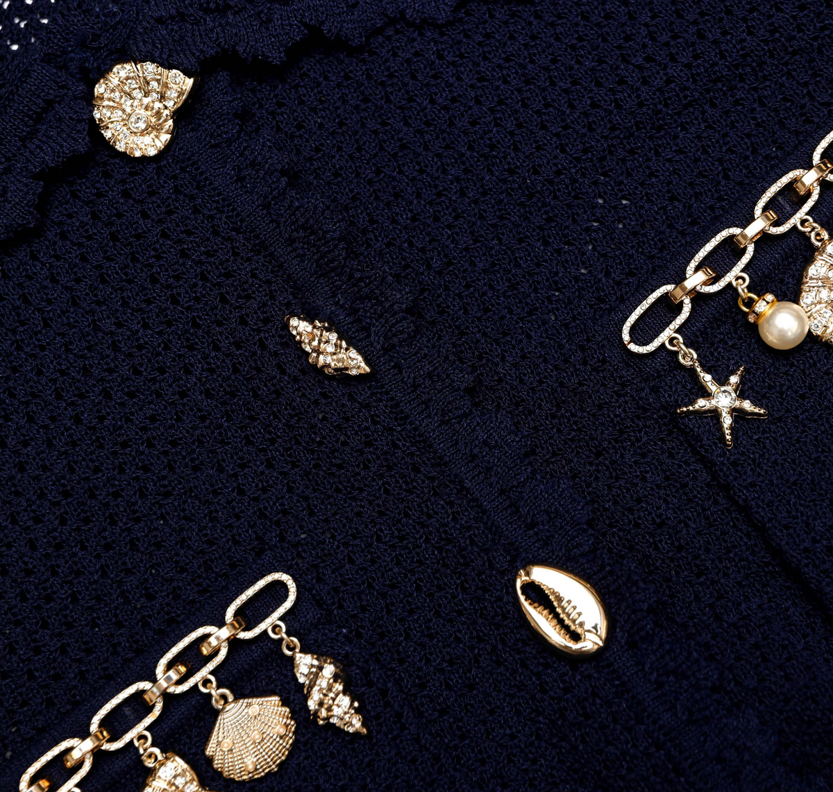 Self-Portrait shell embellished cardigan in navy, close-up of seashell charms and shell buttons