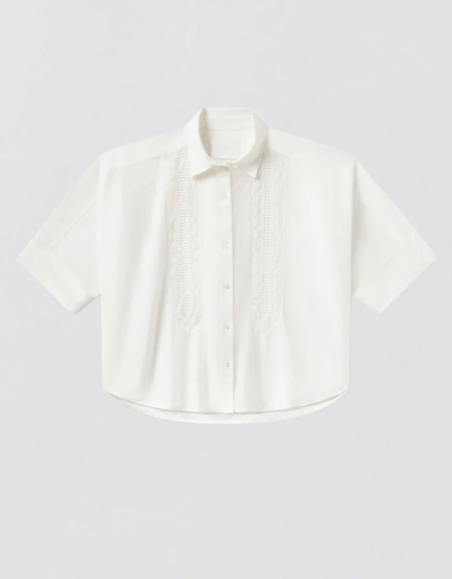 Flat front view of the white Claire shirt with a point collar, button front and lace inset panels