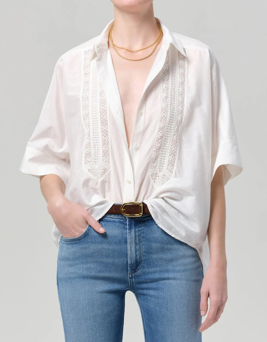 Front view of the Citizens of Humanity Claire shirt in white with lace inset panels, worn with jeans