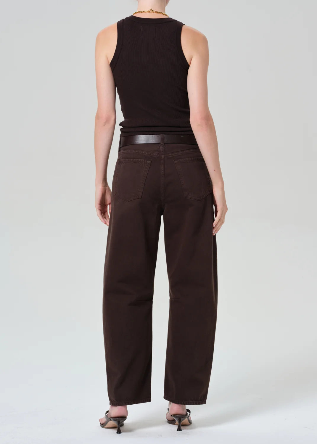 Citizens of Humanity Miro Relaxed Jean in Carob, dark brown denim — back view on model