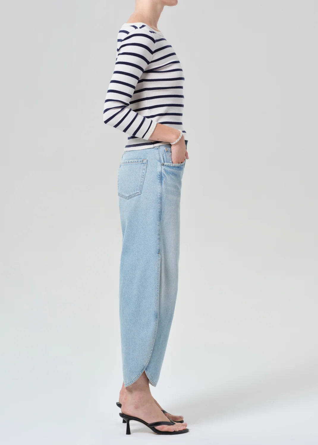 Citizens of Humanity Tulip Jean in Somersault, light indigo denim — side view on model