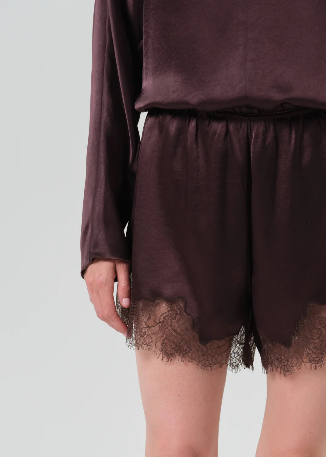 Citizens of Humanity Lace Trimmed Tap Short in Espresso brown, lace hem detail close-up