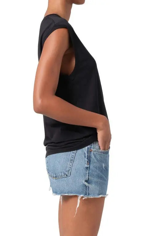 Side view of the black Raya muscle tee showing the longline drape