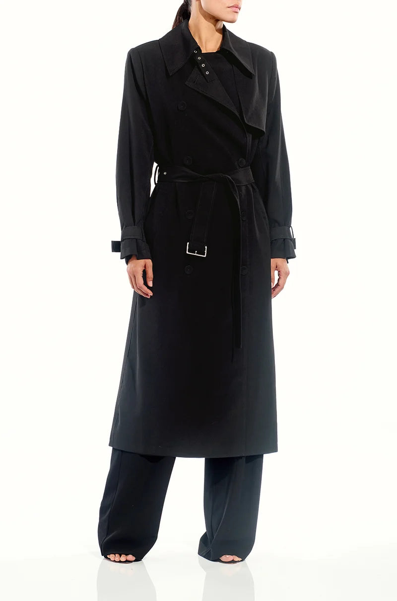 Front three-quarter view of The Sei structured trench coat in black with cuff buckles