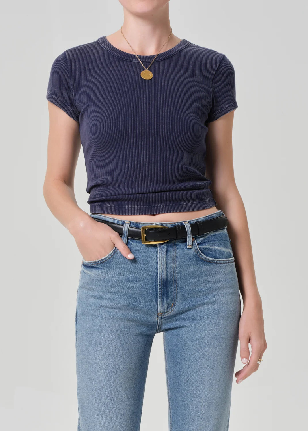 Front view of the Citizens of Humanity Nello tee in Mineral Navy with a crew neckline, worn with jeans