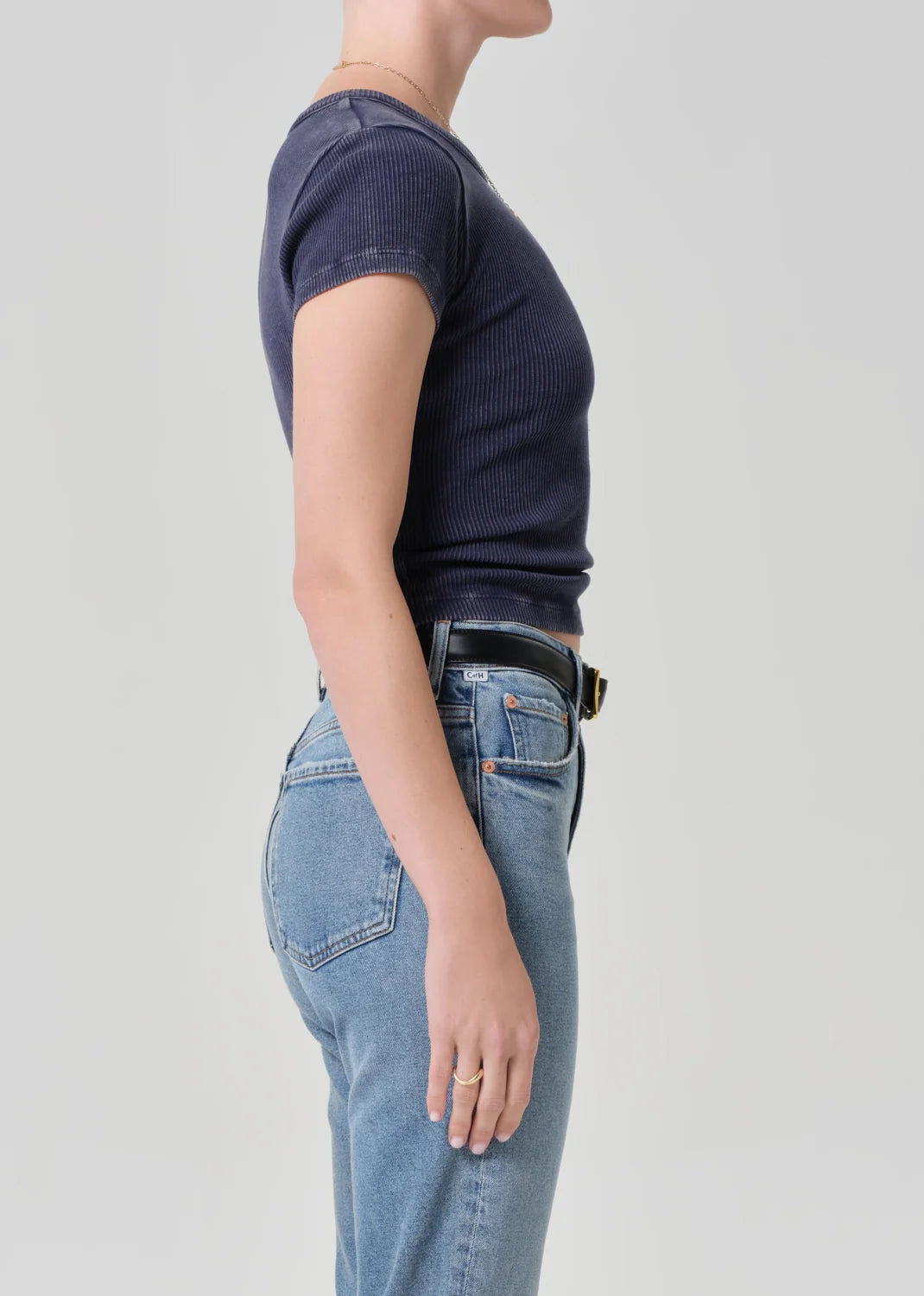 Side view of the Nello tee in Mineral Navy showing the close fit and short sleeves