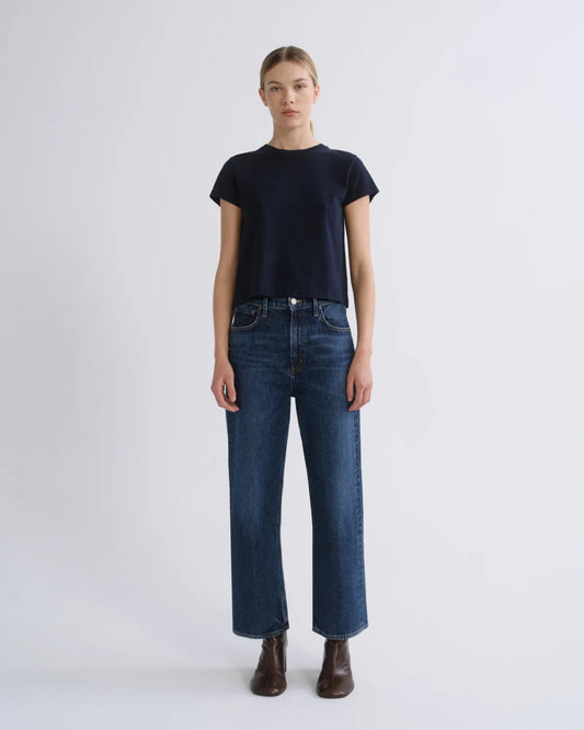 AGOLDE Ren high rise wide leg jean in Echo dark vintage indigo wash, front view, worn with a navy tee