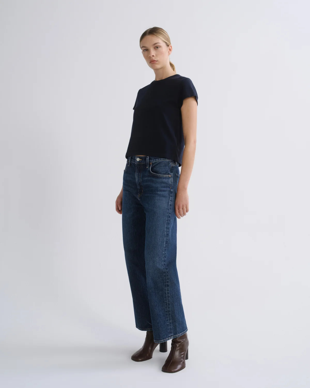 AGOLDE Ren high rise wide leg jean in Echo dark vintage indigo wash, three-quarter front view