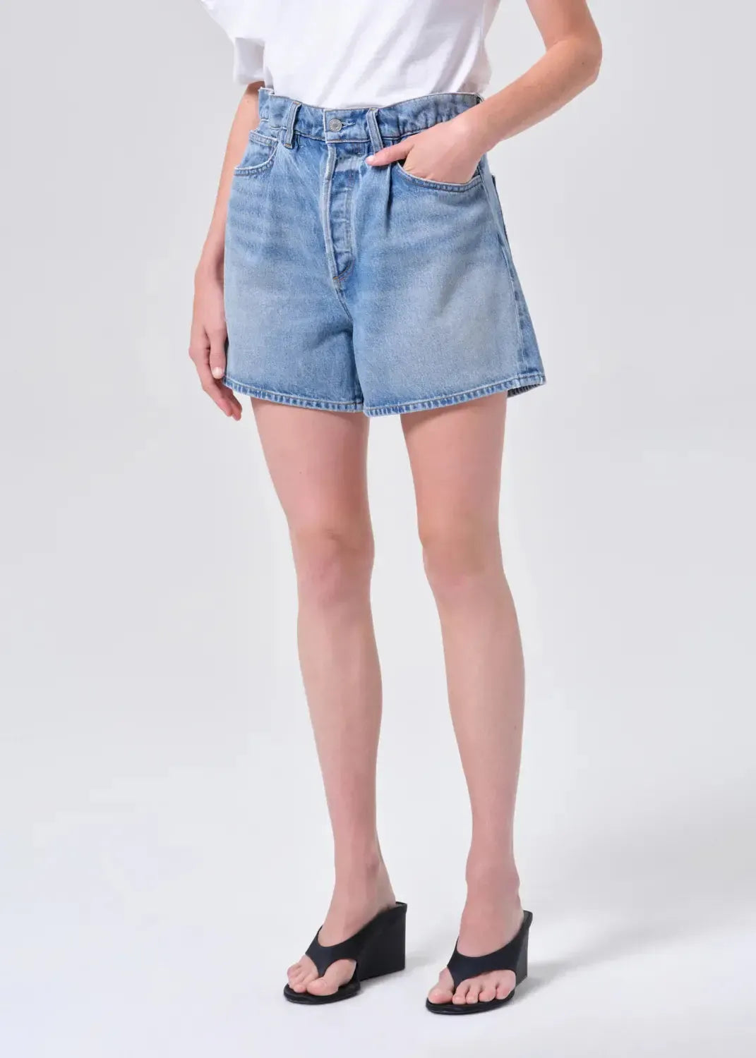 AGOLDE Lyonne Short in Outbreak, three-quarter front view on model
