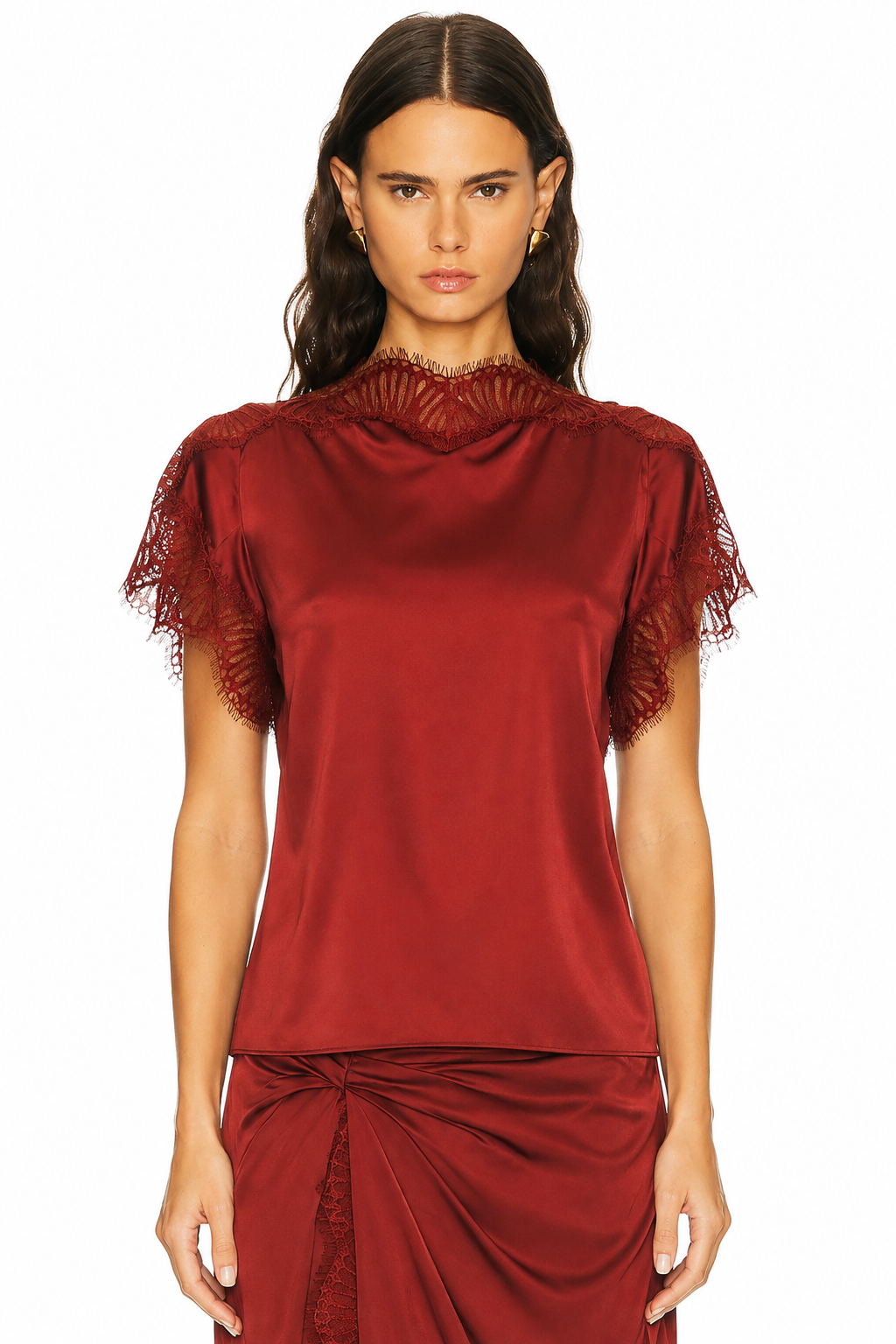 A model wearing an ALC deep red satin top with sheer lace ruffle details on the shoulders and a matching draped skirt, shot against a solid white background.