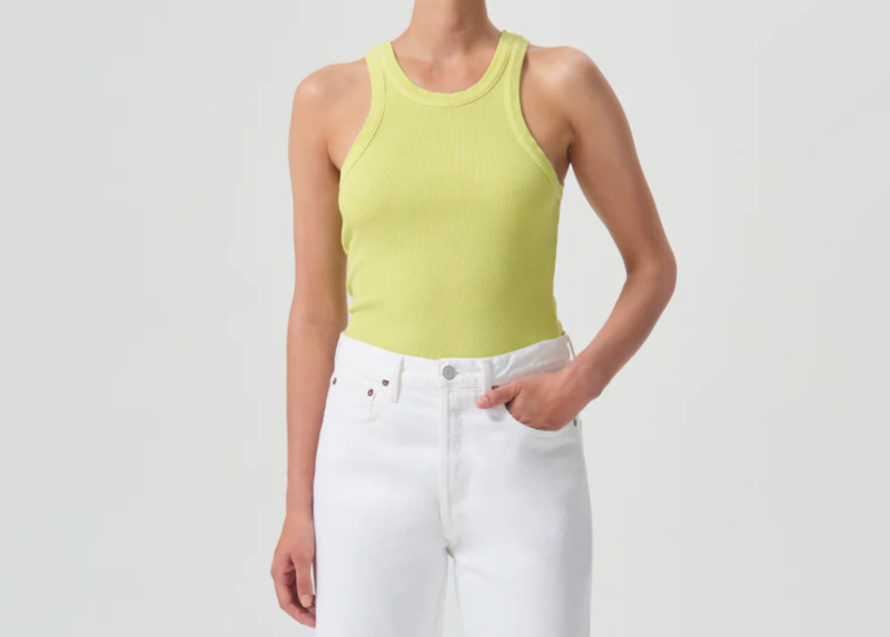 Front view of the AGOLDE Bailey scoop neck tank in Mantis, a bright chartreuse rib knit, worn with white jeans