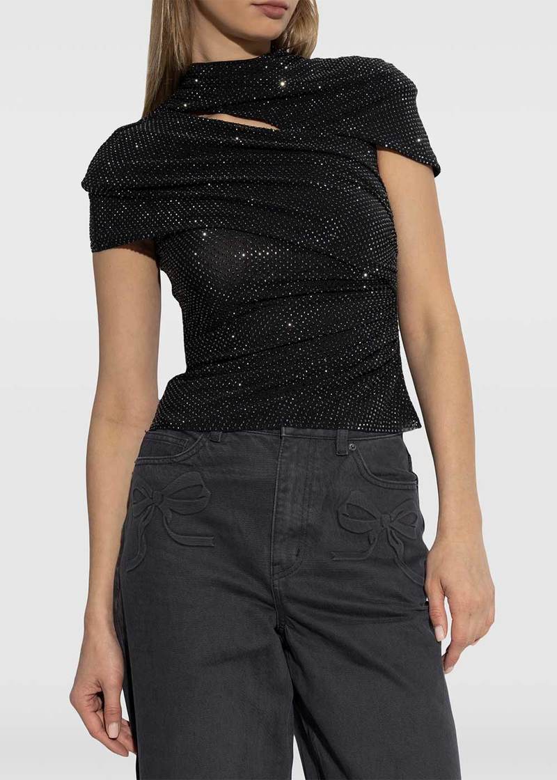 Front view of the Self-Portrait rhinestone mesh cut-out top in black, worn with black jeans