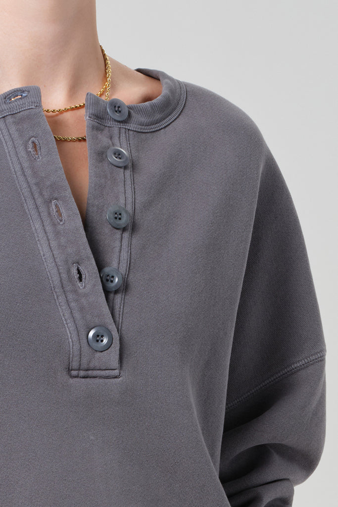 Citizens of Humanity Rhomboid Henley in Dark Grey, close-up of button placket neckline