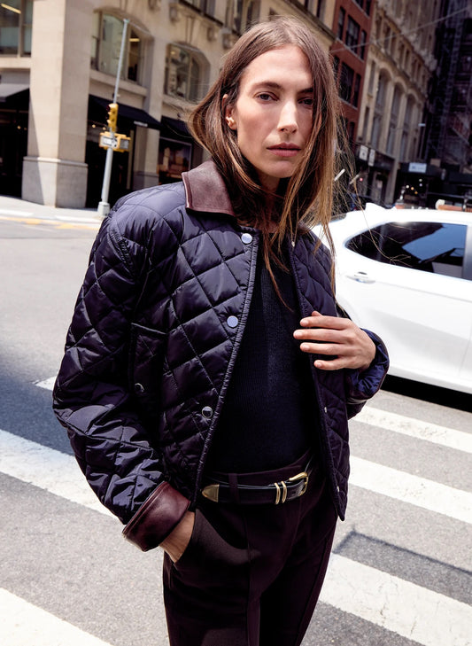 Model wearing A.L.C. Henri Quilted Jacket, layered fall/winter look”