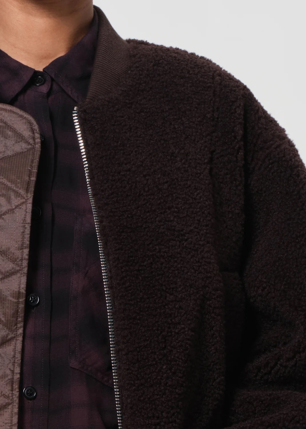 Close-up AGOLDE Iona Skye Jacket — stitching and rich chocolate wash