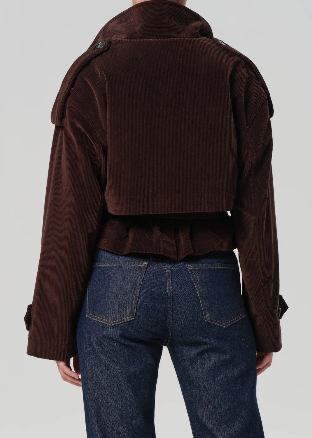 Back view of Short Fari Trench – Manuka, corduroy texture visible