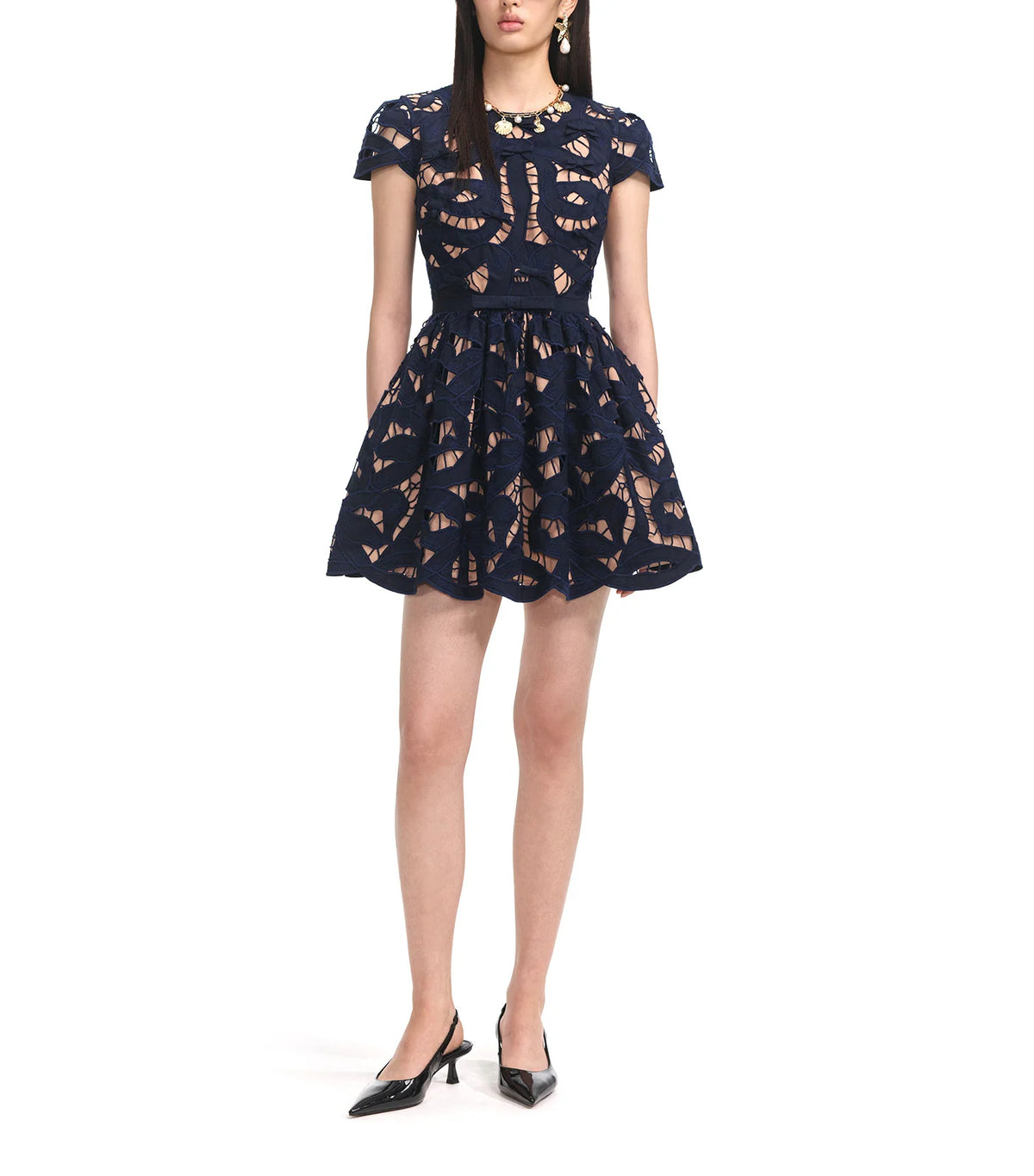 Front full-length view of the navy Self-Portrait bow embroidered mini dress with a flared skirt