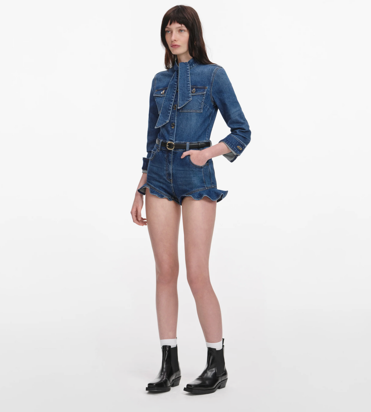 Self-Portrait denim frill playsuit in medium indigo wash, three-quarter front view