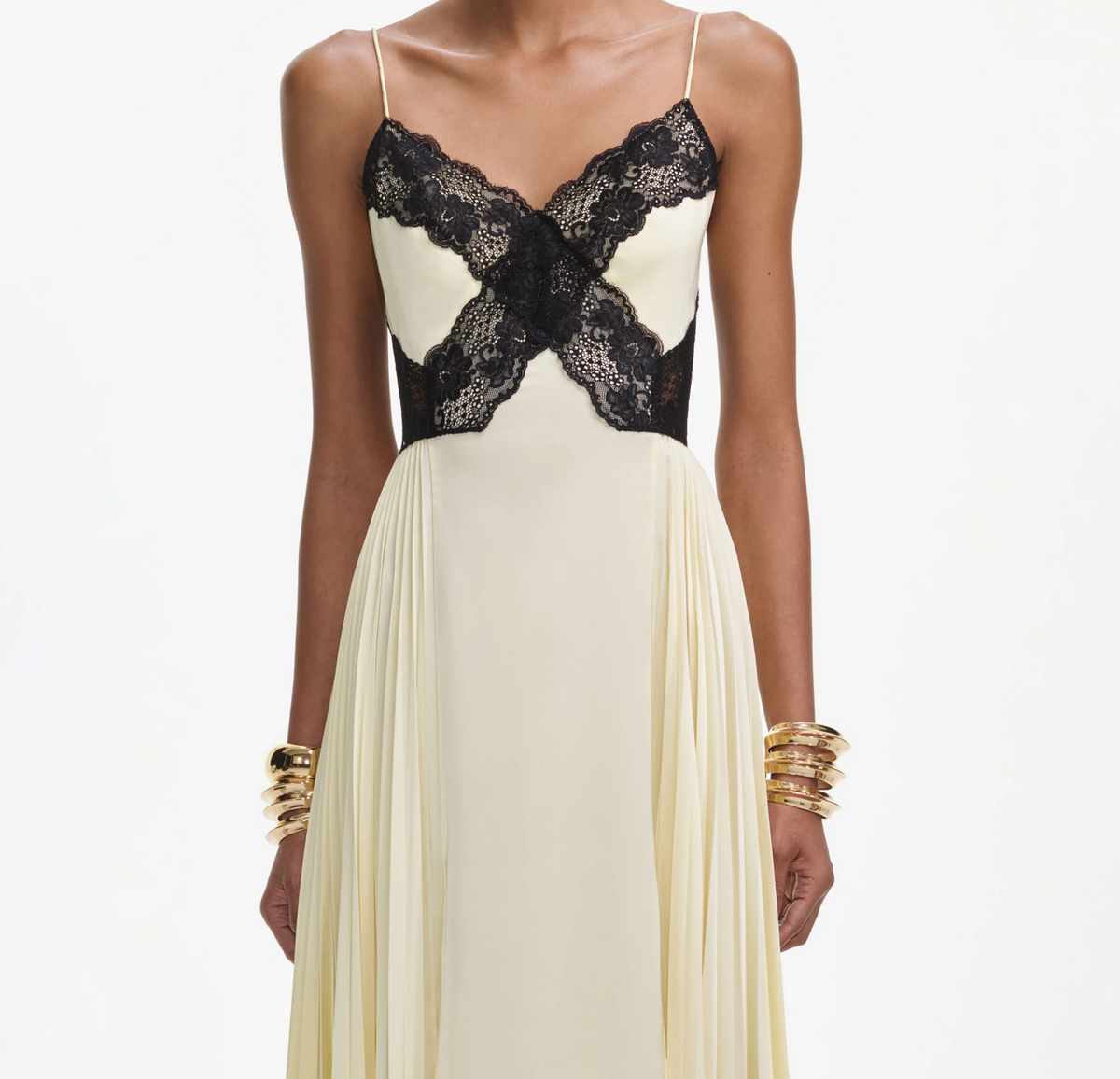 Close-up front view of the black lace crossover bodice of the Self-Portrait satin lace maxi dress in yellow