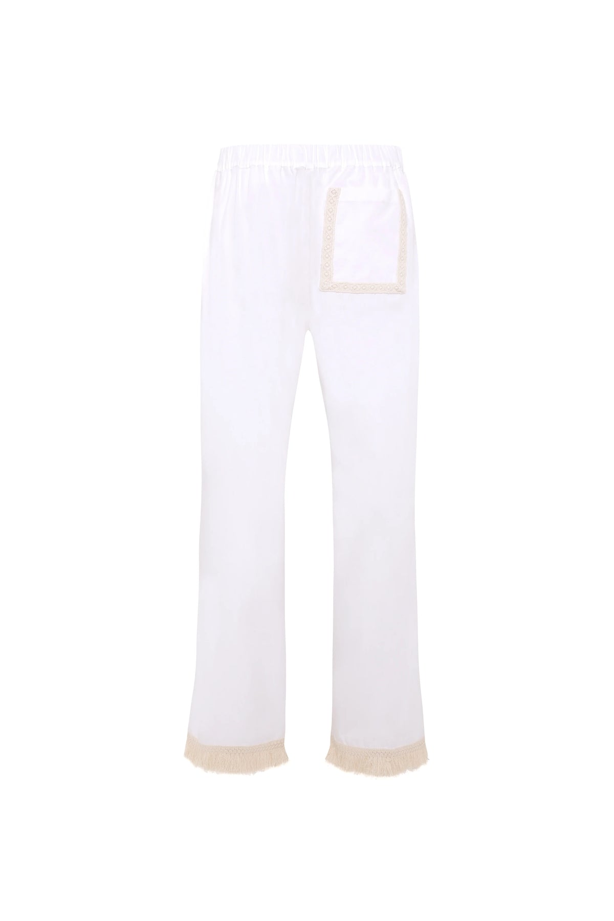 Back view of the white Savina pants showing the lace-trimmed back pocket and fringed hem