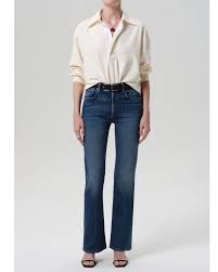 Citizens of Humanity Vidia bootcut jean in Abalone medium indigo wash, front view, worn with a cream shirt