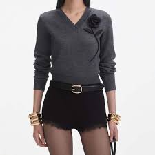 Self-Portrait grey V-neck rose jumper worn with black shorts, front view